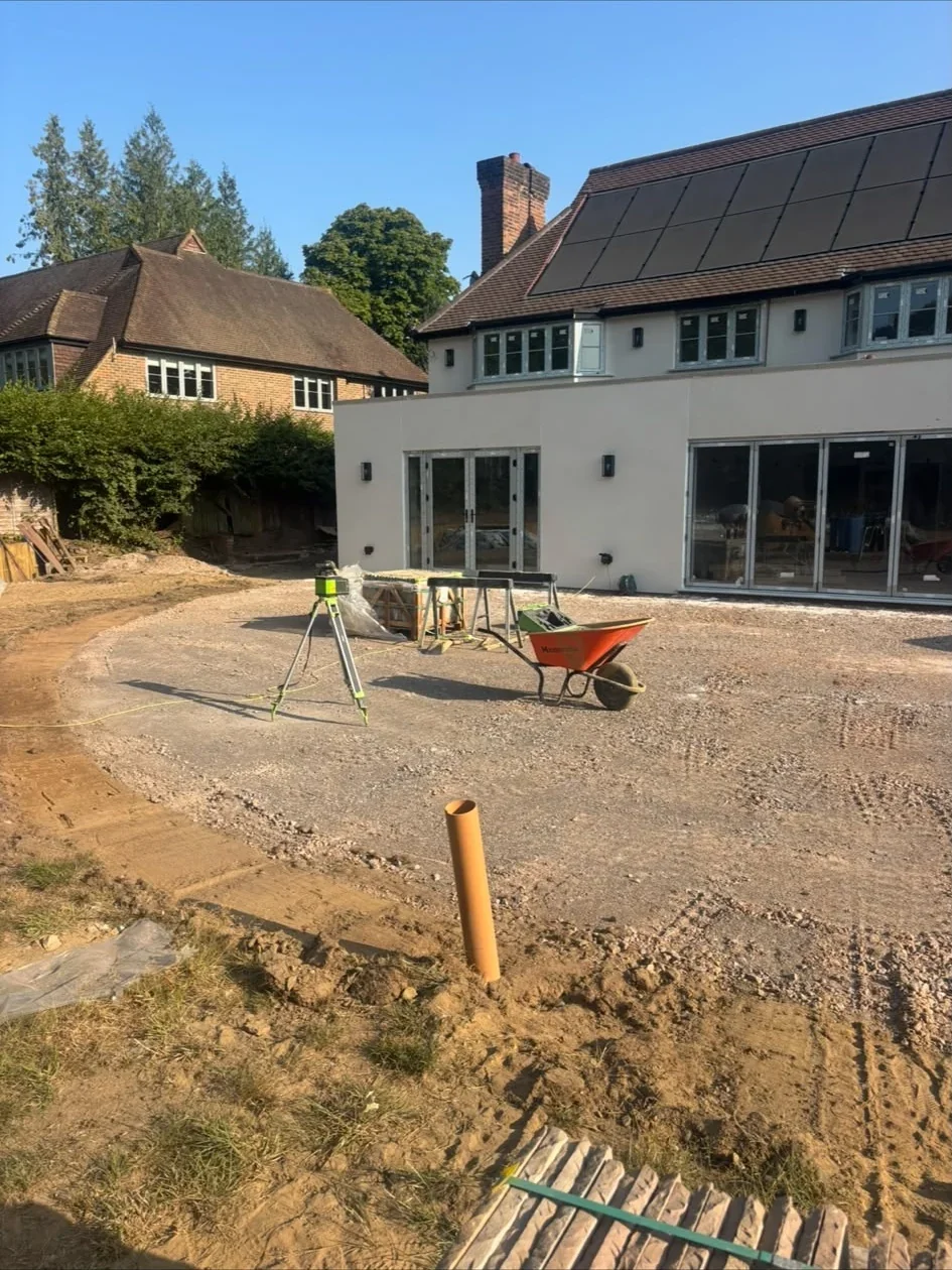 Modern rear house extension with glazed doors in Surrey
