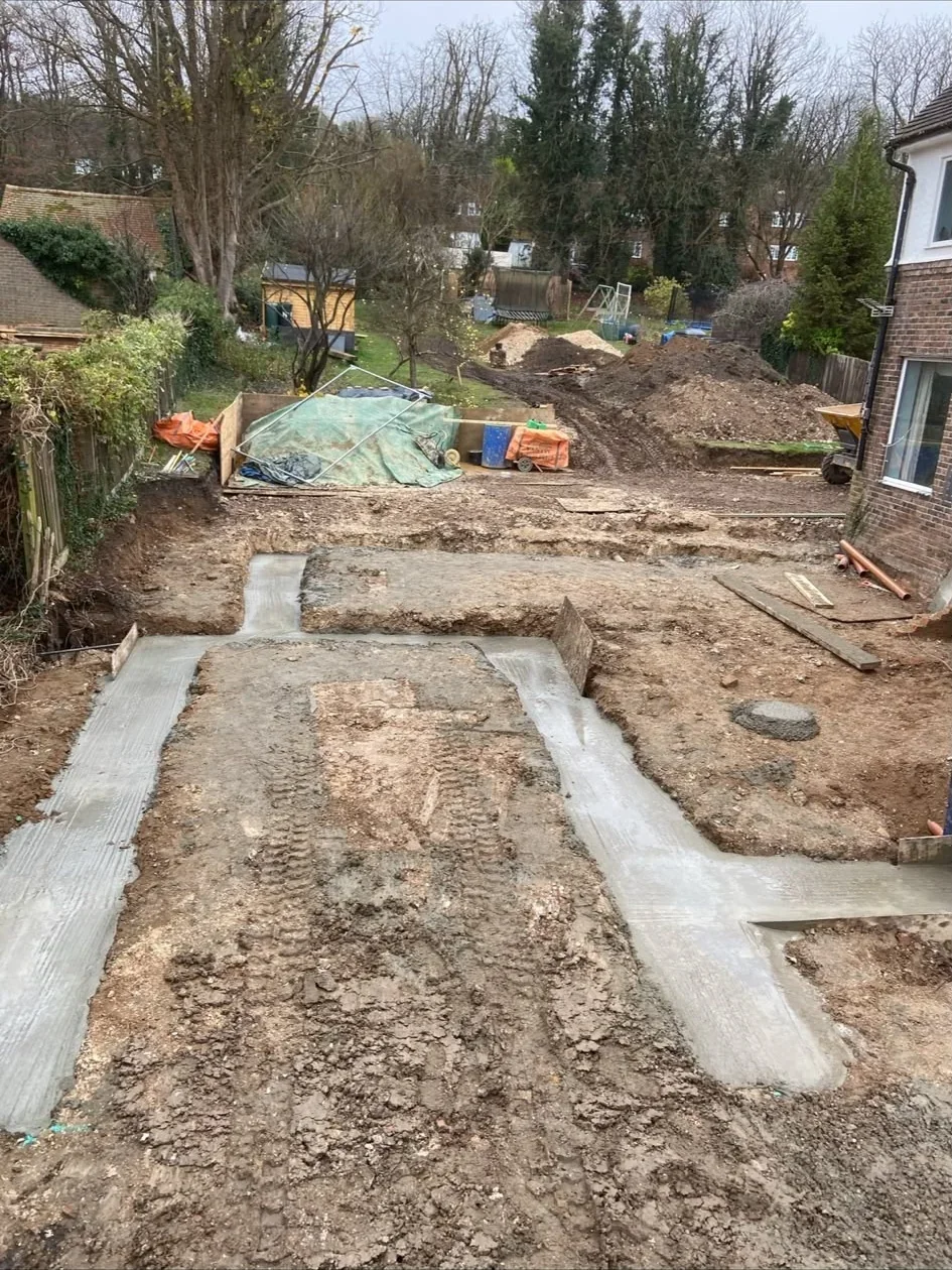 Concrete foundations poured for a rear extension